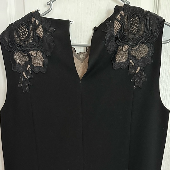 BCBG black dress with lace detail on chest and over shoulders. Size medium. - Picture 4 of 4